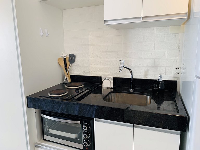 Oásis Urbano: Studio Deslumbrante com Piscina na Cobertura b